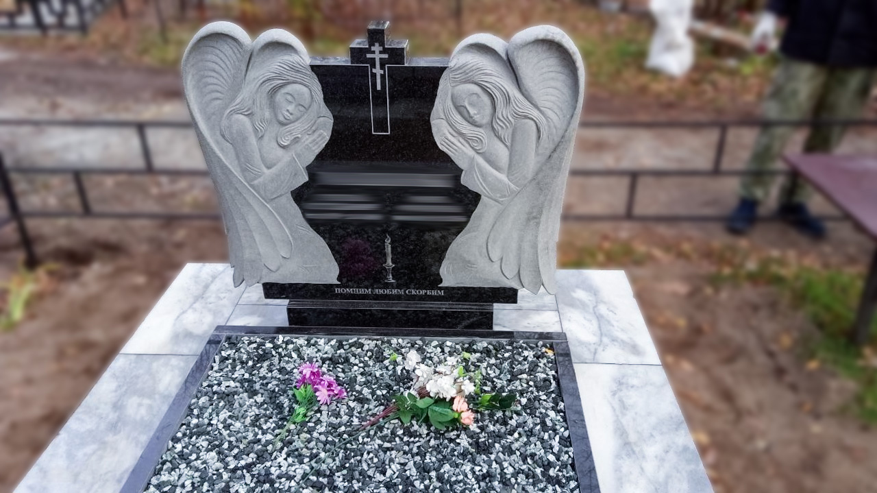 Памятник с ангелом на могилу: символ любви и утешения