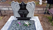 Памятник с ангелом на могилу: символ любви и утешения