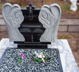 Памятник с ангелом на могилу: символ любви и утешения
